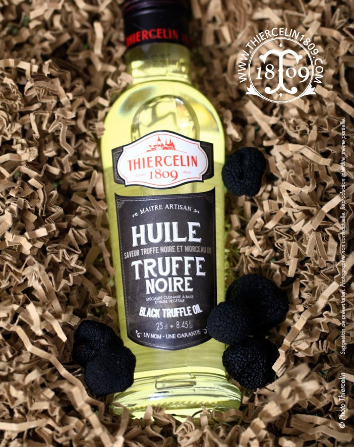 Huile de Truffe noire avec morceau de truffe noire tuber melanosporum